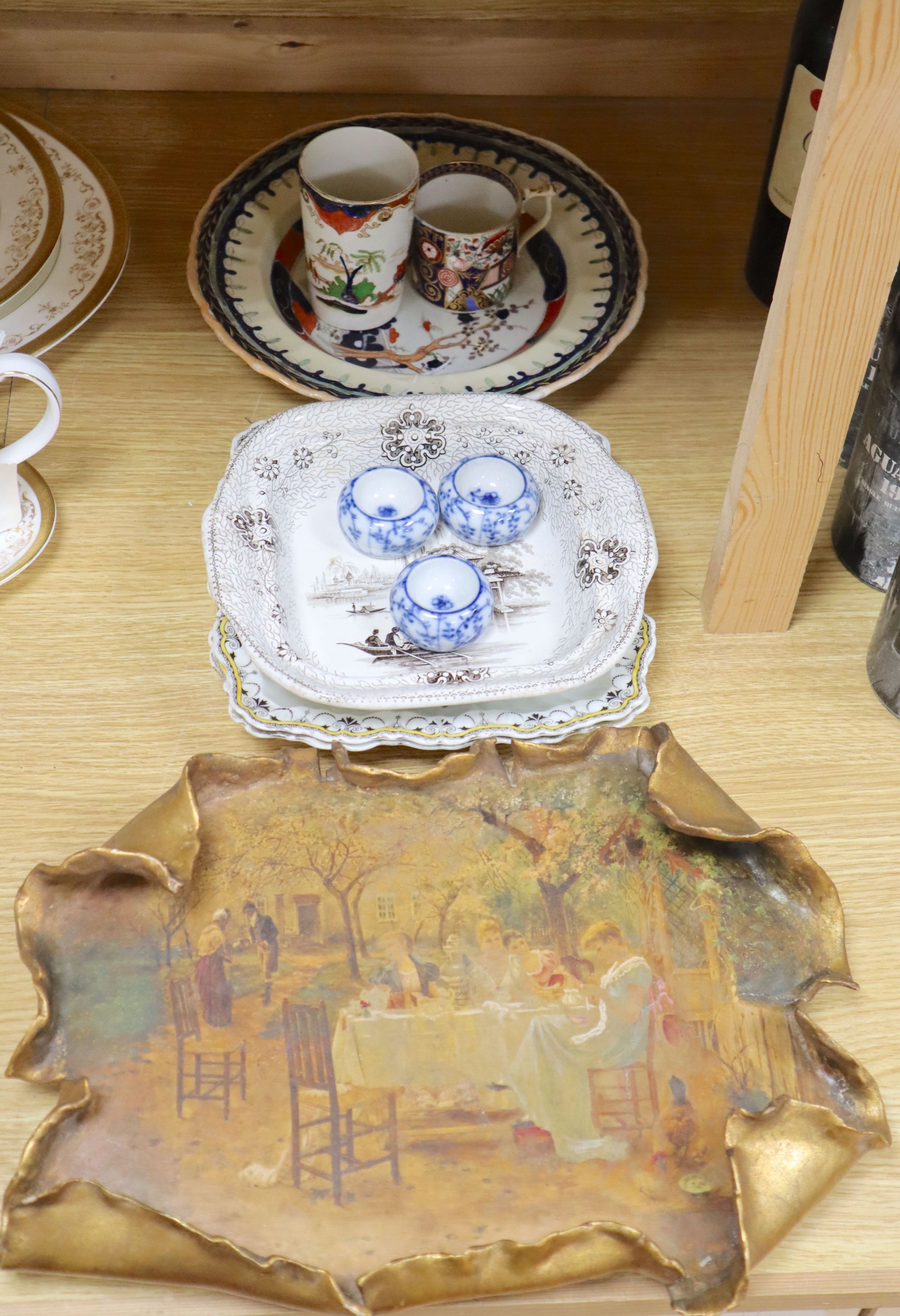 A gilt painted pottery plaque and mixed ceramics